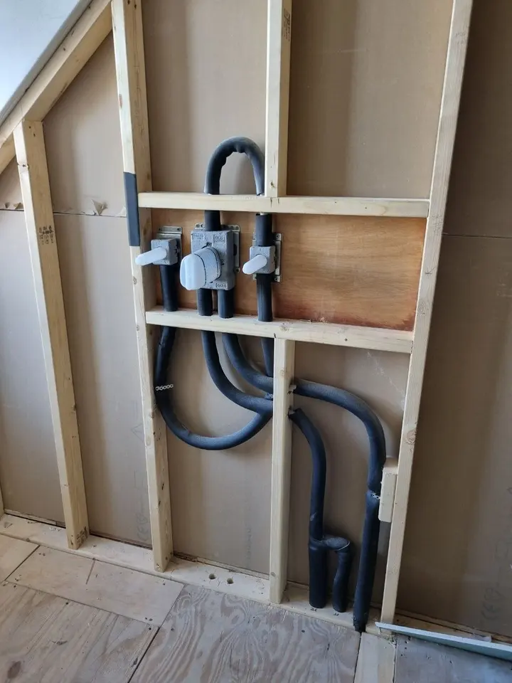 Shower valve and pipework fitted in a wall